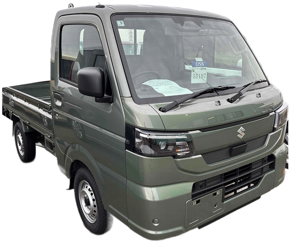 Green Suzuki Carry kei truck, one of our four arrivals